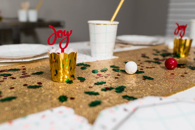 Holiday Party Treat Cups and Tableware on Gold Sequin Runner
